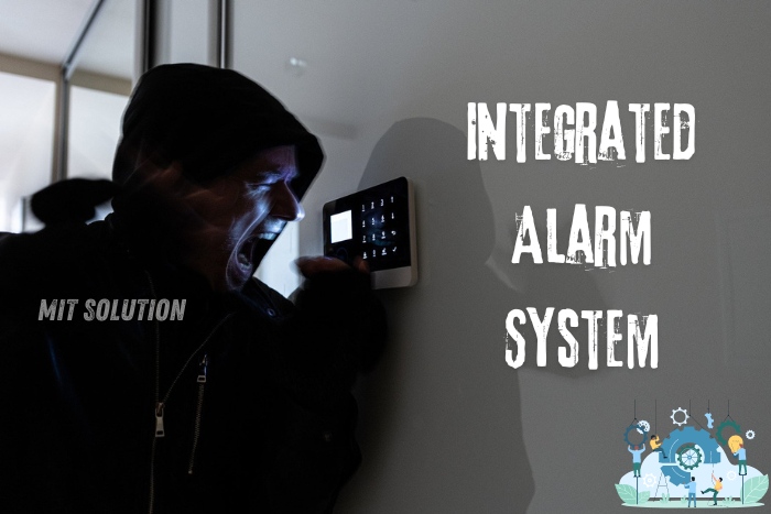 A burglar frustrated by an integrated alarm system, highlighting the effectiveness of security solutions provided by MIT Solution in Dindigul, Tamil Nadu. The caption 'Integrated Alarm System' emphasizes the robust protection and advanced features offered by MIT Solution's comprehensive alarm systems