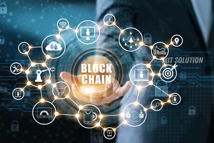 A digital representation of blockchain technology with interconnected icons symbolizing various applications, provided by MIT Solution in Dindigul, Tamil Nadu. The caption 'Blockchain' emphasizes the advanced and secure technology solutions offered by MIT Solution for modern businesses.